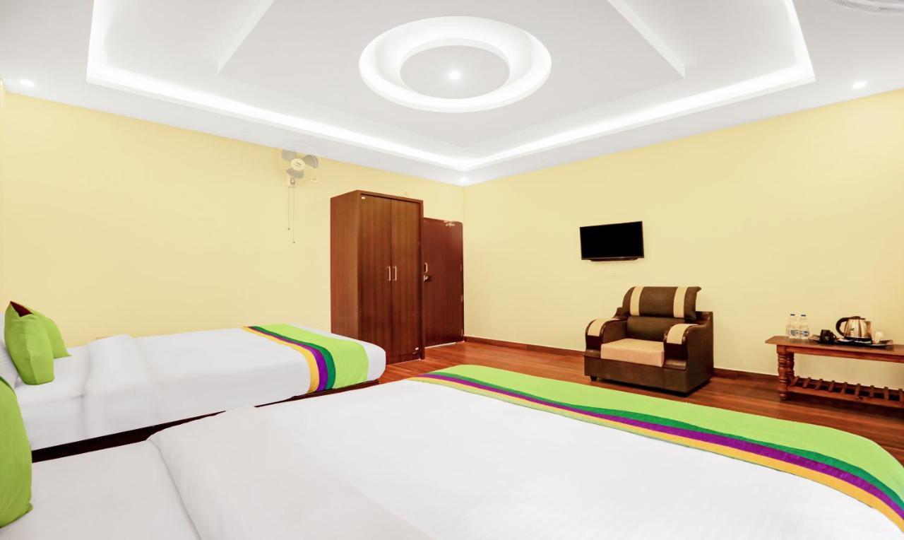 Hotel Treebo Doha King Madikeri Esterno foto